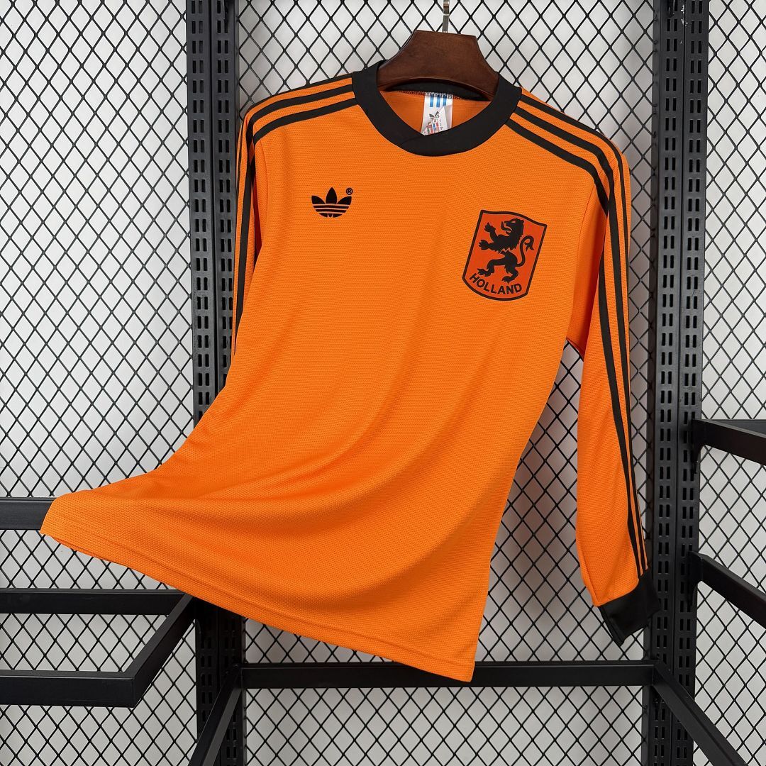 Mens Netherlands Retro Long Sleeve Home Jersey 1980 Mens Netherlands Retro Long Sleeve Home Jersey 1980 front view in orange with black stripes and KNVB lion crest