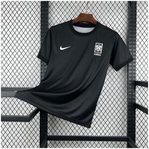 Mens South Korea Pre-Match Jersey 2026 Mens South Korea Pre-Match Jersey 2026 front view in black with white tiger crest and Nike Swoosh