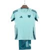 Light aqua kids Cruzeiro training shirt with teal shoulder stripes, front view